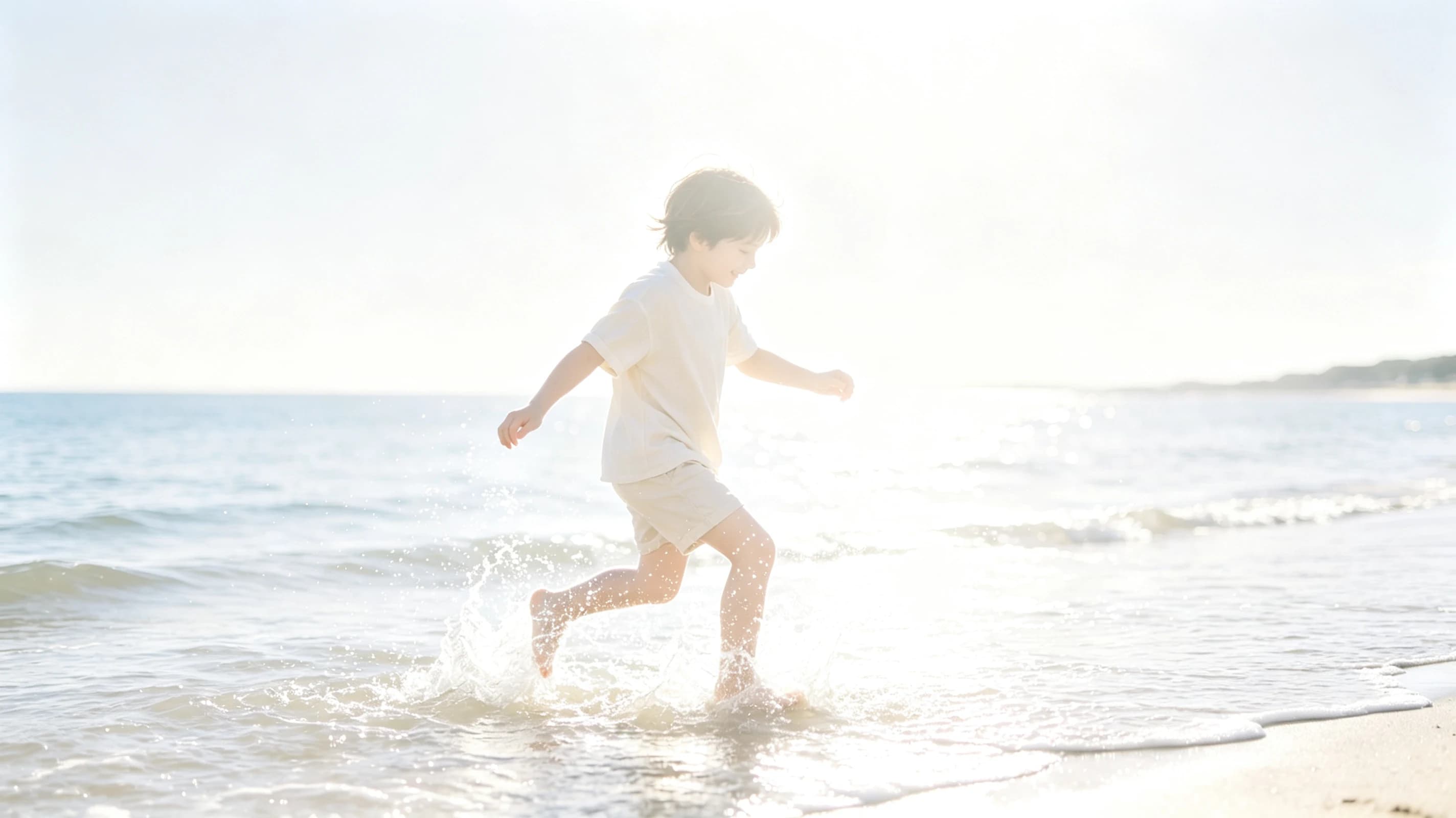 Overexposed child at the beach before correction